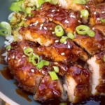 Crispy chicken thighs with a sticky teriyaki sauce